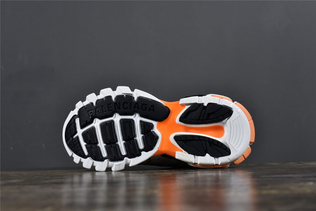 white and orange balenciagas
